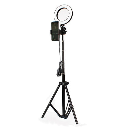 Black tripod stand with ring light and smartphone holder, Bluetooth remote attached, isolated on white