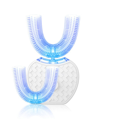 Two U-shaped blue silicone electric toothbrush heads with soft bristles and a white textured base