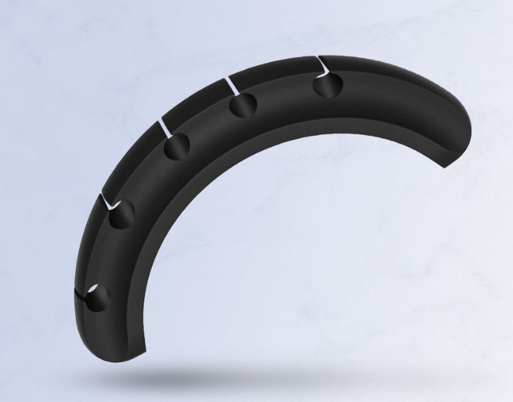 Black silicone cable organizer clip with multiple slots for desk wire management