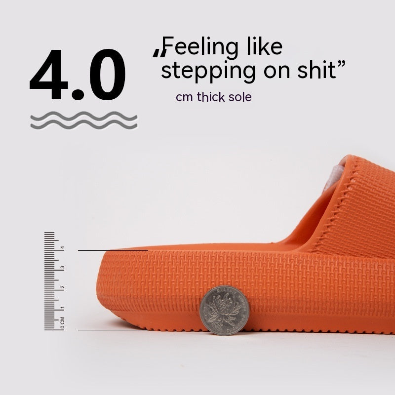 Orange EVA platform slipper with 4 cm thick sole shown next to ruler and coin for size comparison