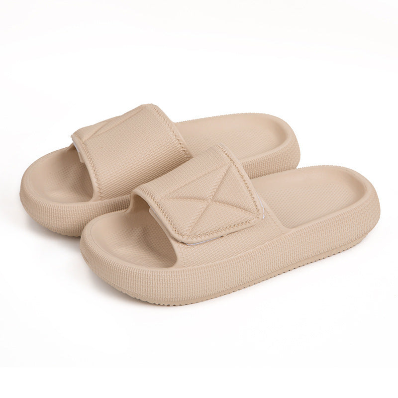 Beige EVA platform slippers with adjustable strap, lightweight cushioning, and textured sole