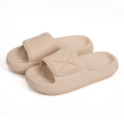 Beige EVA platform slippers with adjustable strap, lightweight cushioning, and textured sole