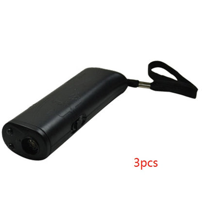 black ultrasonic dog repeller with wrist strap for humane dog training and safe walking