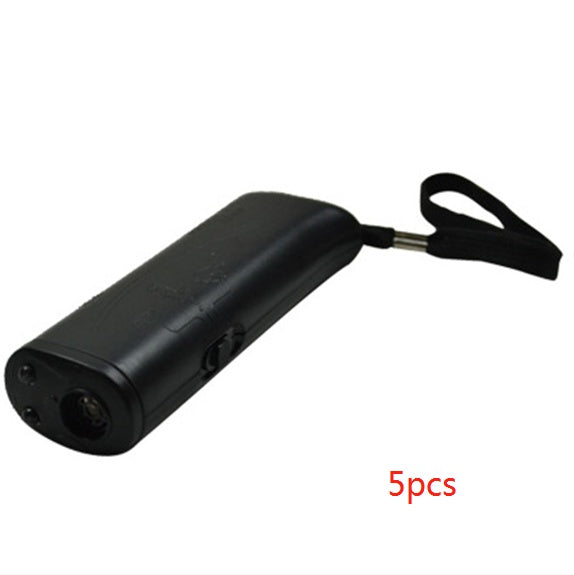 black ultrasonic dog repeller device with wrist strap against white background
