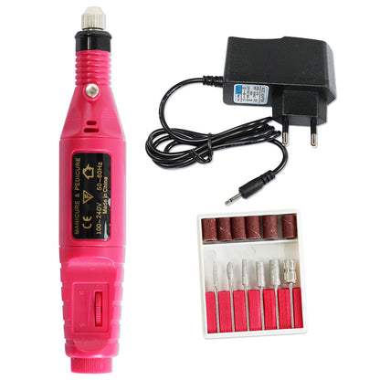 Pink electric manicure and pedicure drill set with power adapter and assorted nail drill bits