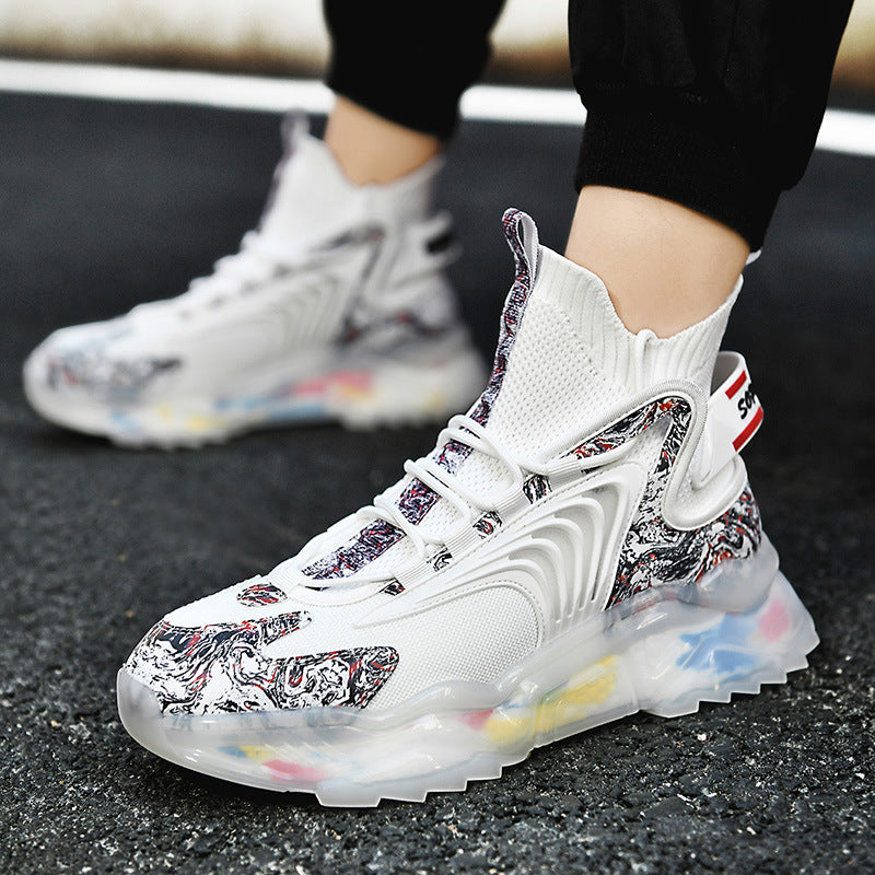 Men's white high-top sneakers with colorful marbled patterns and translucent multicolor sole on asphalt