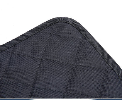 Close-up of black textured waterproof dog car seat cover with anti-skid mesh and piped edges