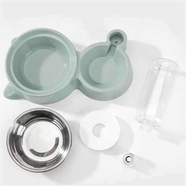 Disassembled light green automatic pet feeder with stainless steel bowl and clear water dispenser parts