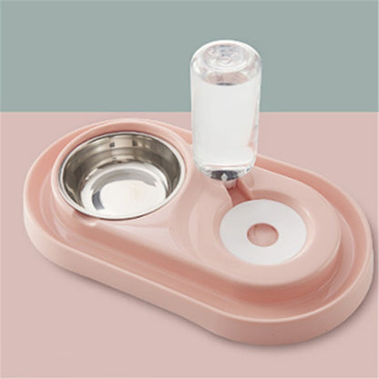 pink automatic dog bowl with stainless steel water dispenser and ball refill system on two-tone surface