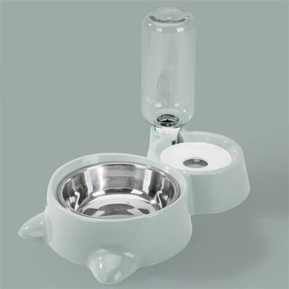 pink automatic dog bowl with stainless steel bowl and clear water dispenser on gray background