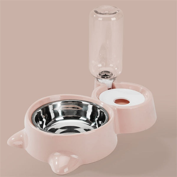Pink automatic dog bowl with stainless steel food dish and attached water dispenser