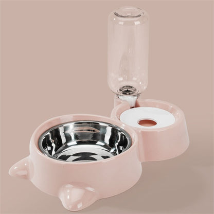Pink automatic dog bowl with stainless steel food dish and attached water dispenser