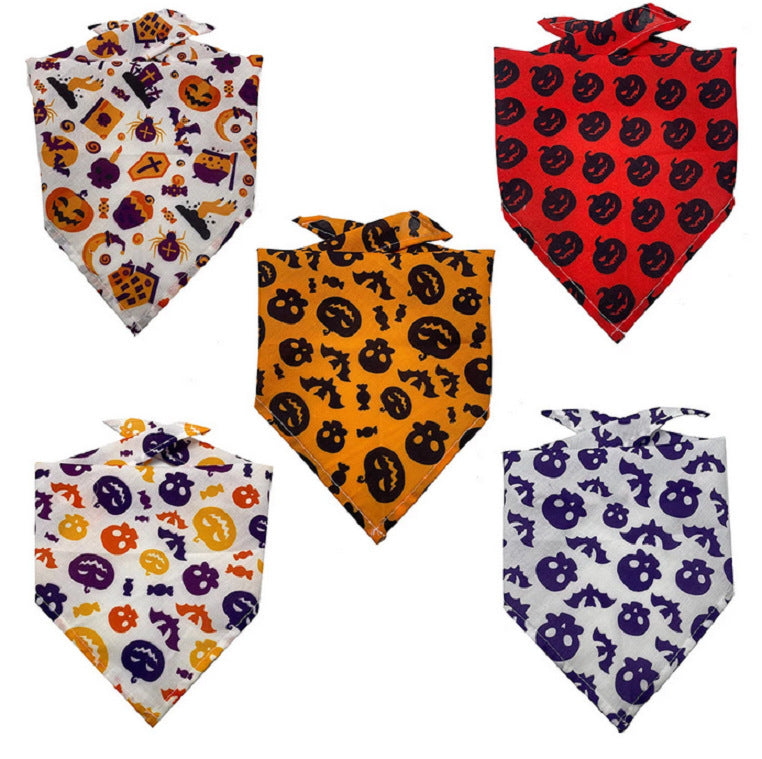 Five Halloween-themed pet bandanas with pumpkin, skull, and bat patterns in orange, red, white, and purple colors