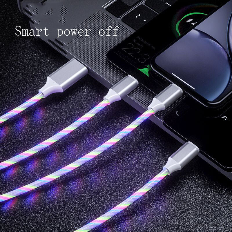 3-in-1 LED glowing charging cables connected to a laptop and smartphones with smart power off feature