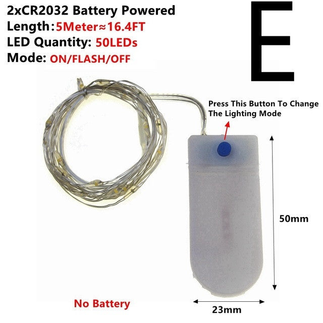 Battery-powered warm white copper wire fairy lights with 50 LEDs and blue mode button