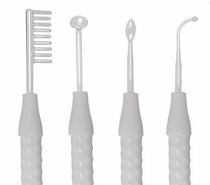 Set of four white high frequency skin therapy wand electrodes with different shaped glass tips