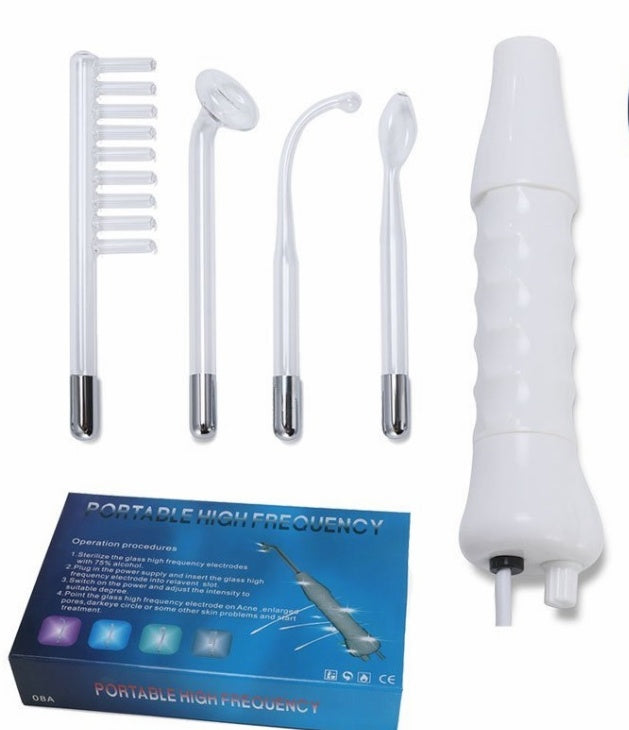 Portable high frequency skin therapy wand with four glass electrodes and blue box for acne treatment