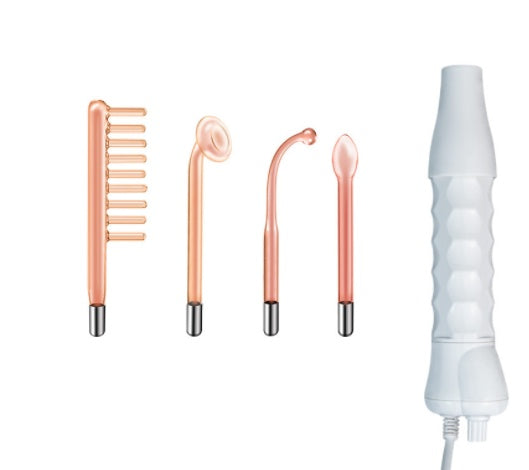 High frequency skin therapy device with four copper electrode attachments for acne treatment