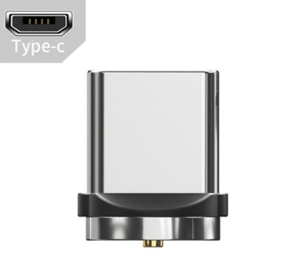 Close-up of a compact Apple magnetic USB-C connector with metallic finish and black base