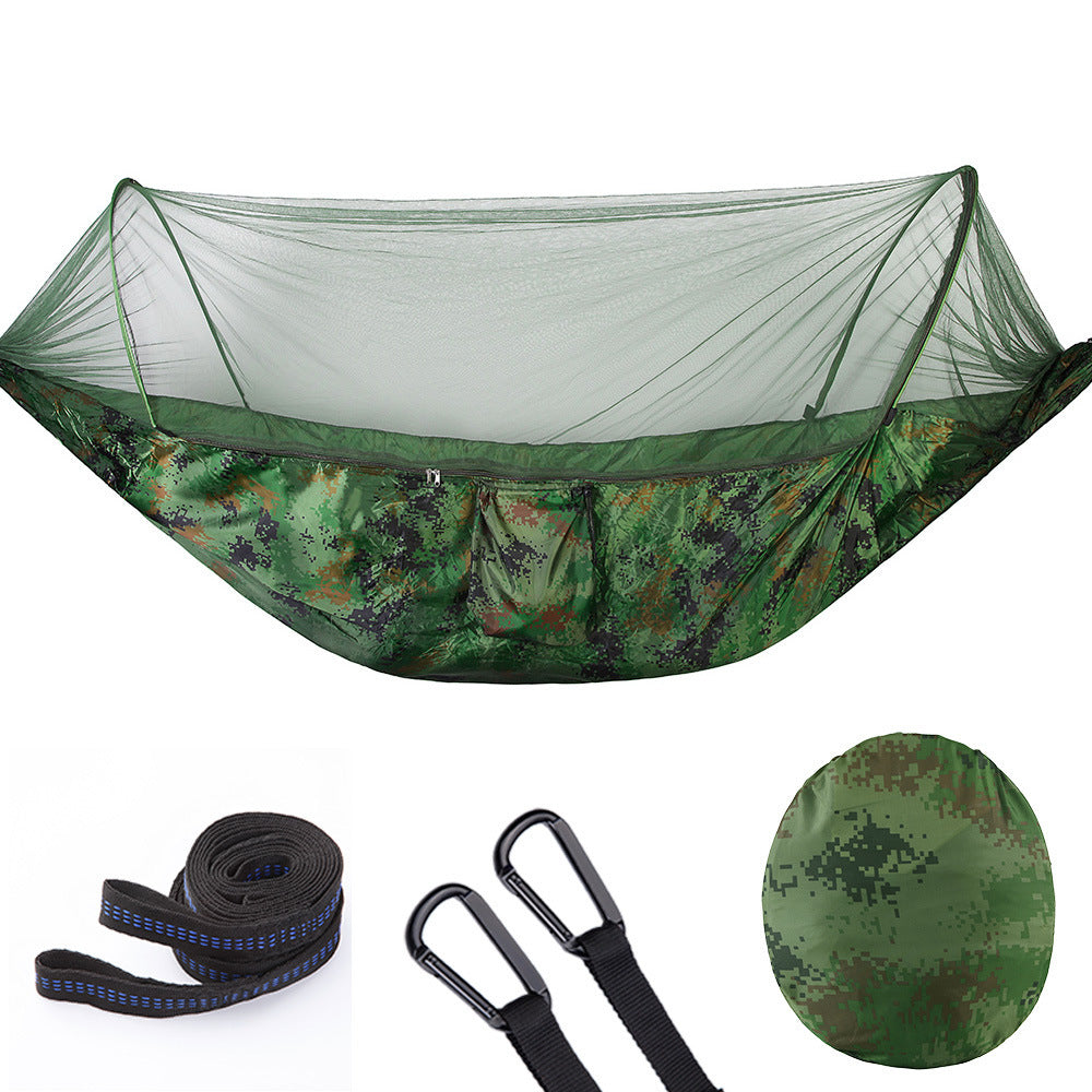 Green camo automatic camping hammock with mosquito net, straps, carabiners, and carry bag