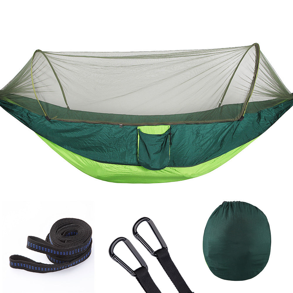 Green and lime automatic camping hammock with mosquito net, straps, carabiners, and storage bag