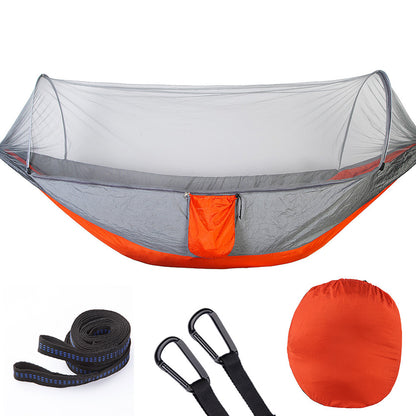 Orange and gray camping hammock with mosquito net, straps, carabiners, and storage bag