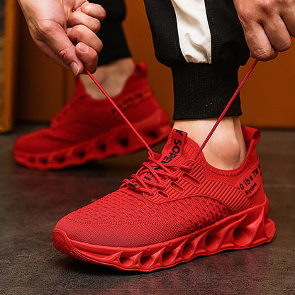 red men's breathable mesh running shoes with unique ventilated sole, laced up on black pants