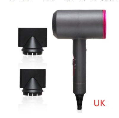 Gray hotel hair dryer with pink trim and two black concentrator nozzles on white background, UK plug