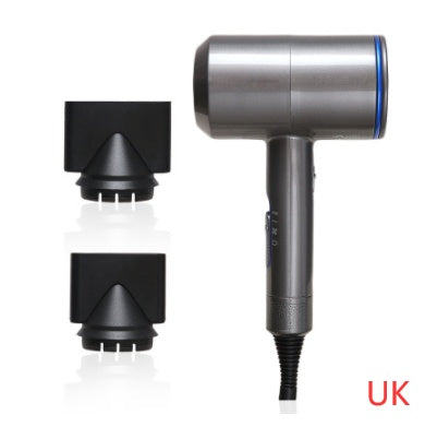 Silver and black hotel hair dryer with two black nozzle attachments and UK plug