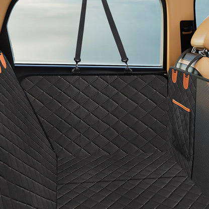 Black waterproof quilted dog car seat cover with universal fit and storage pocket in vehicle backseat