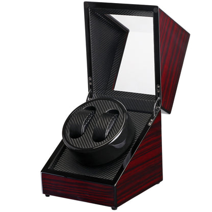 Black single head watch winder with carbon fiber interior and glossy red wood case, open lid