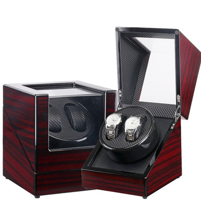 Black and mahogany watch winder with PU leather case holding two automatic silver watches