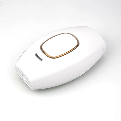 White Trendoligy IPL hair removal device with gold accent for home use on white background