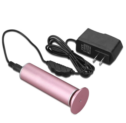 Pink cylindrical rechargeable electric callus remover pedicure tool with black power adapter and cord