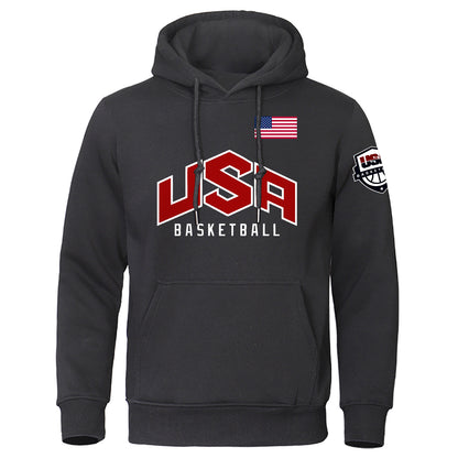 Black USA basketball hoodie with red lettering, American flag, and basketball logo on sleeve