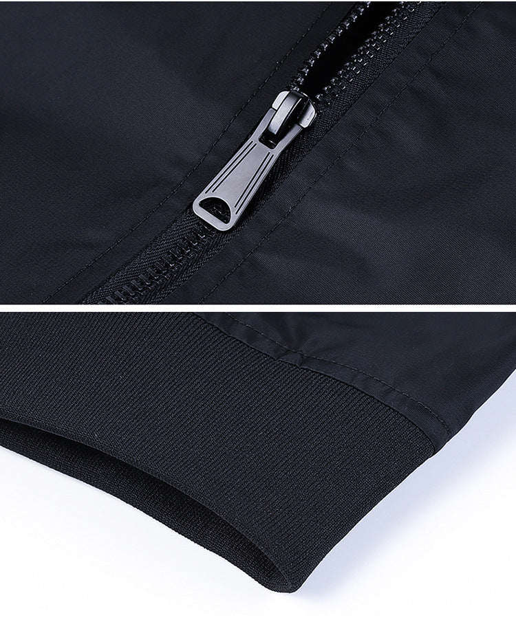 Close-up of a black men's bomber jacket sleeve with ribbed cuff and metal zipper detail