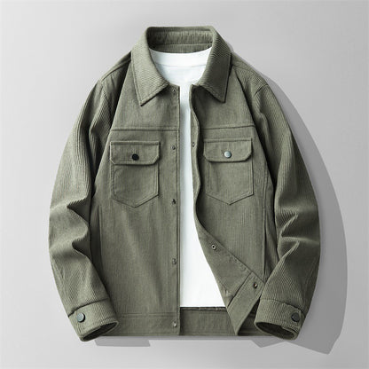 Men's olive green corduroy jacket with flap pockets and snap buttons over white shirt