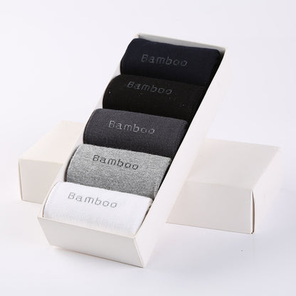 Pack of five mid-calf bamboo socks in black, navy, gray, light gray, and white in white box