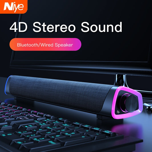 Niye 4D stereo Bluetooth/wired soundbar speaker with RGB lighting on desk with keyboard and monitor