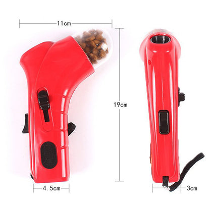 Red interactive pet treat launcher with ergonomic grip and transparent treat compartment, dimensions shown