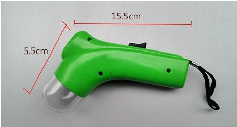 Green interactive pet treat launcher with ergonomic grip and wrist strap, 15.5cm by 5.5cm