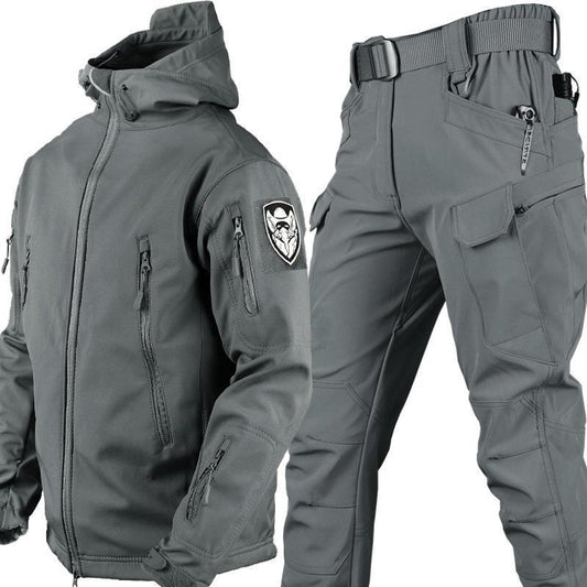 gray tactical jacket with multiple zip pockets and matching cargo pants with belt