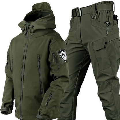 Men's olive green tactical jacket and pants with multiple zippered pockets and adjustable waist belt