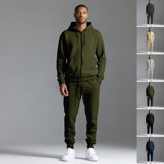 Man wearing olive green cotton blend hooded tracksuit with white sneakers on gray background