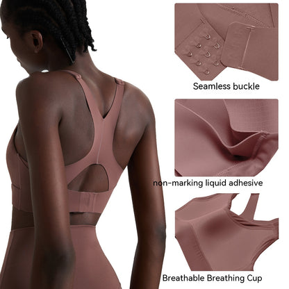 Back view of woman wearing seamless mauve sports bra with breathable cup and liquid adhesive details