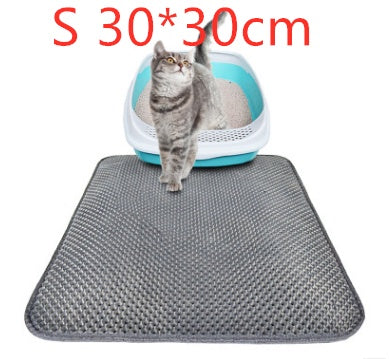 Small honeycomb cat litter mat 30x30cm with gray cat in front of blue litter box