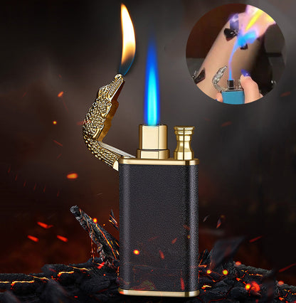 Black and gold metal crocodile lighter with double flame, one blue jet flame and one yellow flame