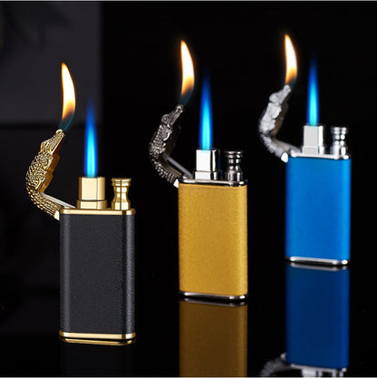 Three double flame windproof metal lighters with crocodile-shaped open caps in black, gold, and blue on black surface