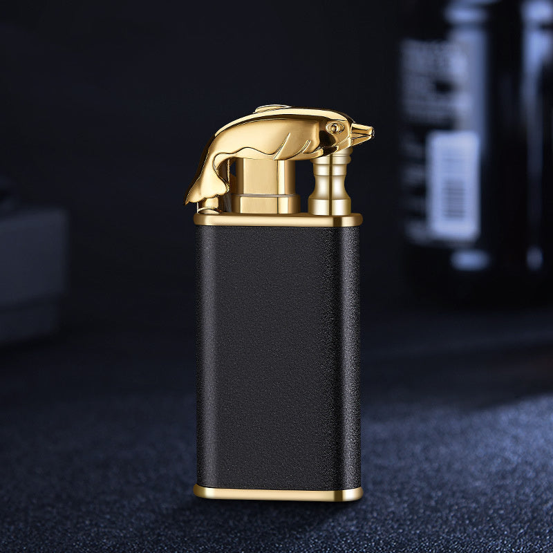 Black and gold metal windproof cigar lighter with gold dolphin design on top