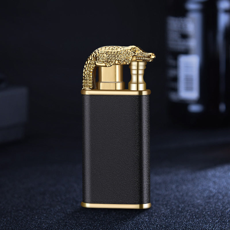 Black metal windproof cigar lighter with gold crocodile design on top